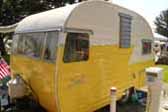 Stunning Early Shasta Trailer paint bright yellow and white